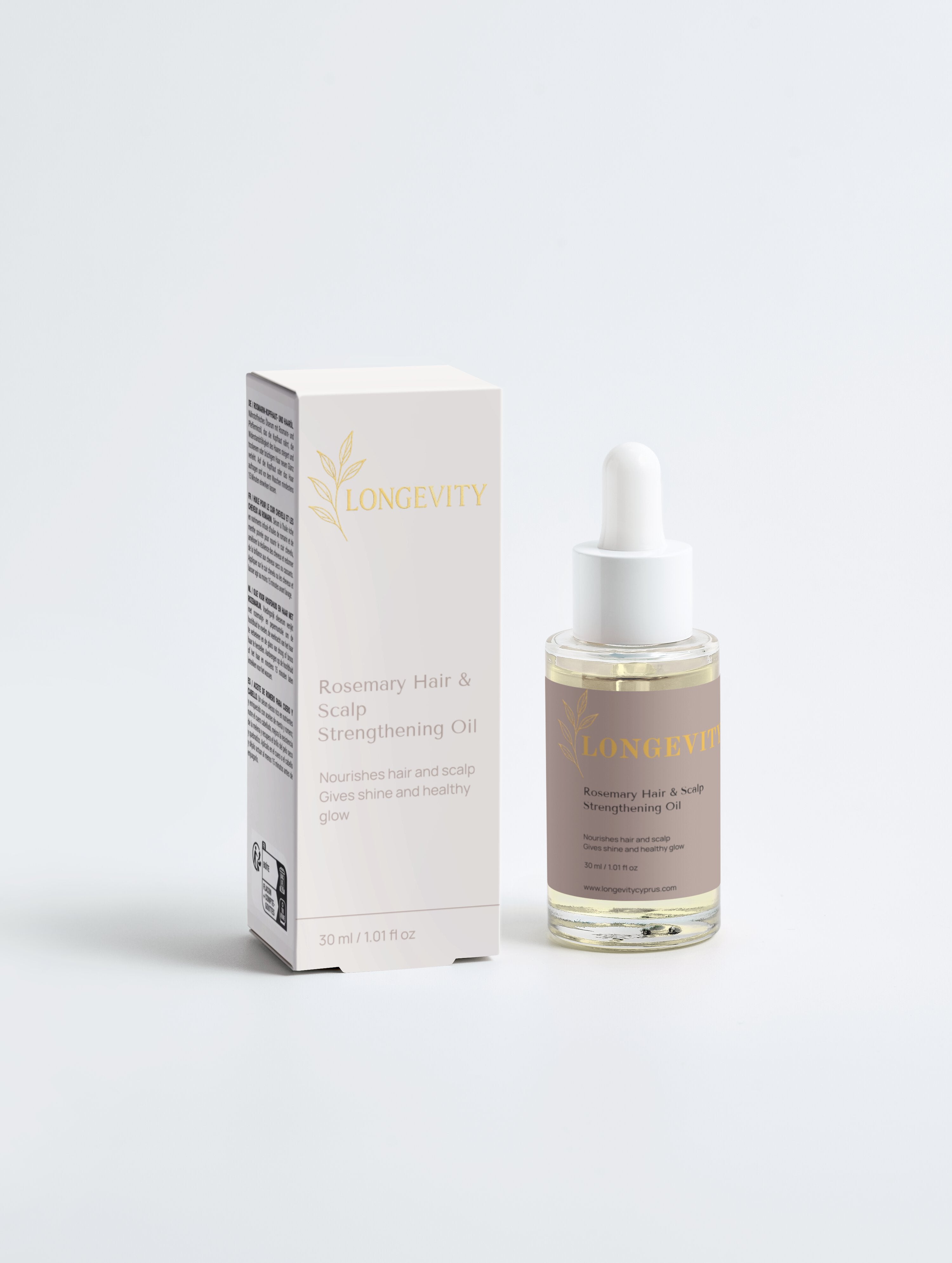 Bottle of Selfnamed Rosemary Hair & Scalp Strengthening Oil with rosemary sprigs and a dropper cap for hair treatment.
