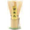 Bamboo matcha whisk from TEMU for preparing traditional green tea, featuring fine bamboo tines and a handle.