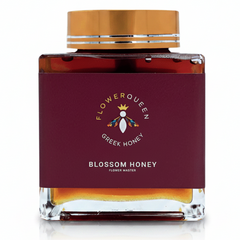 LV Natural Foods Queen Blossom Honey 500g superfood jar with golden honey dripping from a wooden honey dipper.