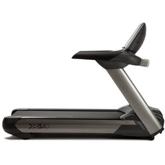 Side view of the Viking Fitness SHUA X-9 professional electric treadmill showing its running deck and control panel.