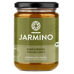 Jarmino Organic Vegetable Broth in a 350ml jar, natural vegan wellness broth with colorful vegetables visible inside