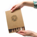 Set of seven AW GIFTS bath salts in small glass vials, ideal for gift packs and relaxing bath experiences.