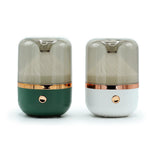 AW Gifts Urban Aroma Diffuser in white and bronze with USB, featuring color-changing LED lights and sleek accessory design.