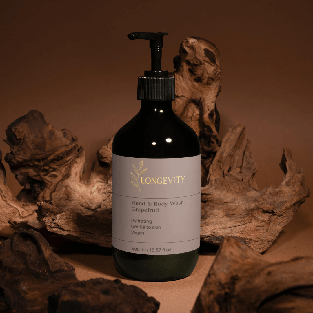 SELFMAMED Grapefruit Hand & Body Wash bottle showing the label with citrus fruit and clear liquid inside, 490 ml size.