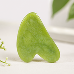 Emerald Xiuyan Gua Sha stone by TEMU, handcrafted natural facial and body massage tool with smooth, polished surface for skincare.