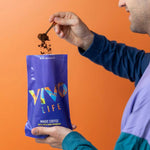 Vivo Life Magic Organic Coffee with Lion’s Mane Mushroom in a coffee cup on a table, showcasing a healthy, organic coffee product.