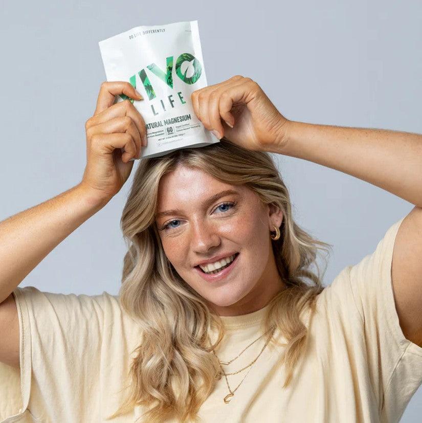 Vivo Life Marine Magnesium supplement powder in a jar, showing the label with 60 servings for muscle and nerve support.