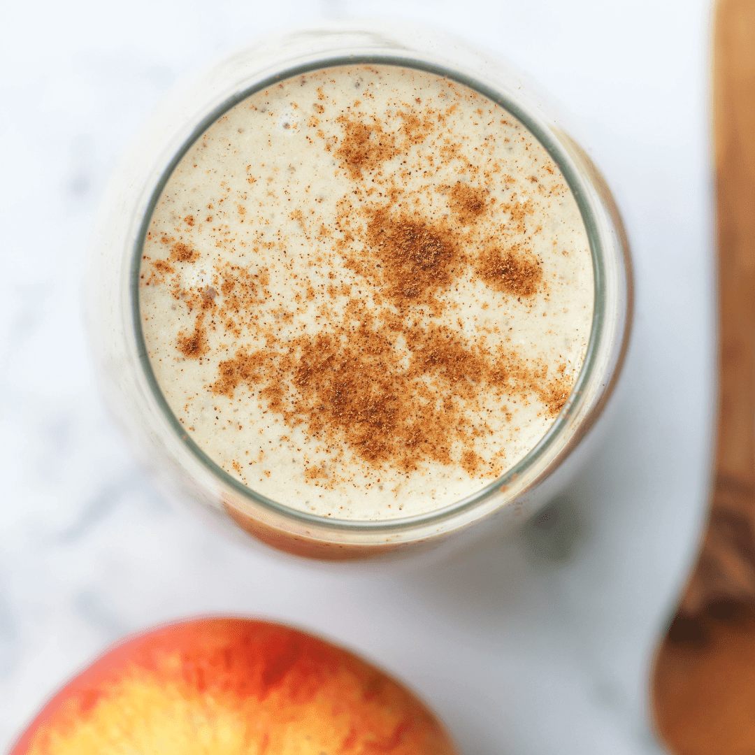 Vegan recipe book titled Green Life 30 Healthy & Delicious Smoothie Recipes, featuring vibrant images of apple pie smoothies.