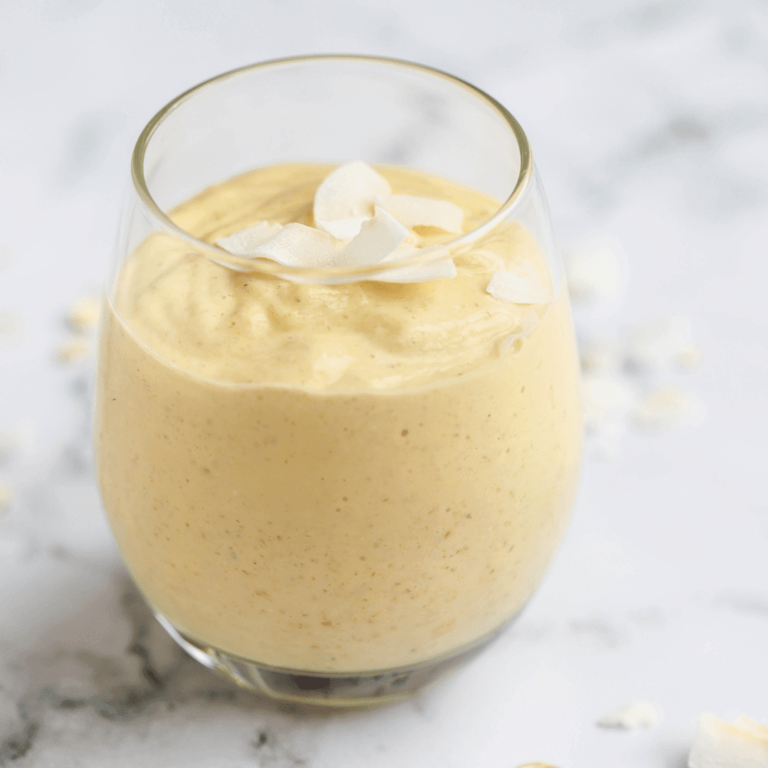 Vegan cookbook from GREEN LIFE BOOKS featuring healthy and delicious smoothie recipes, including a picture of a pineapple coconut smoothie.