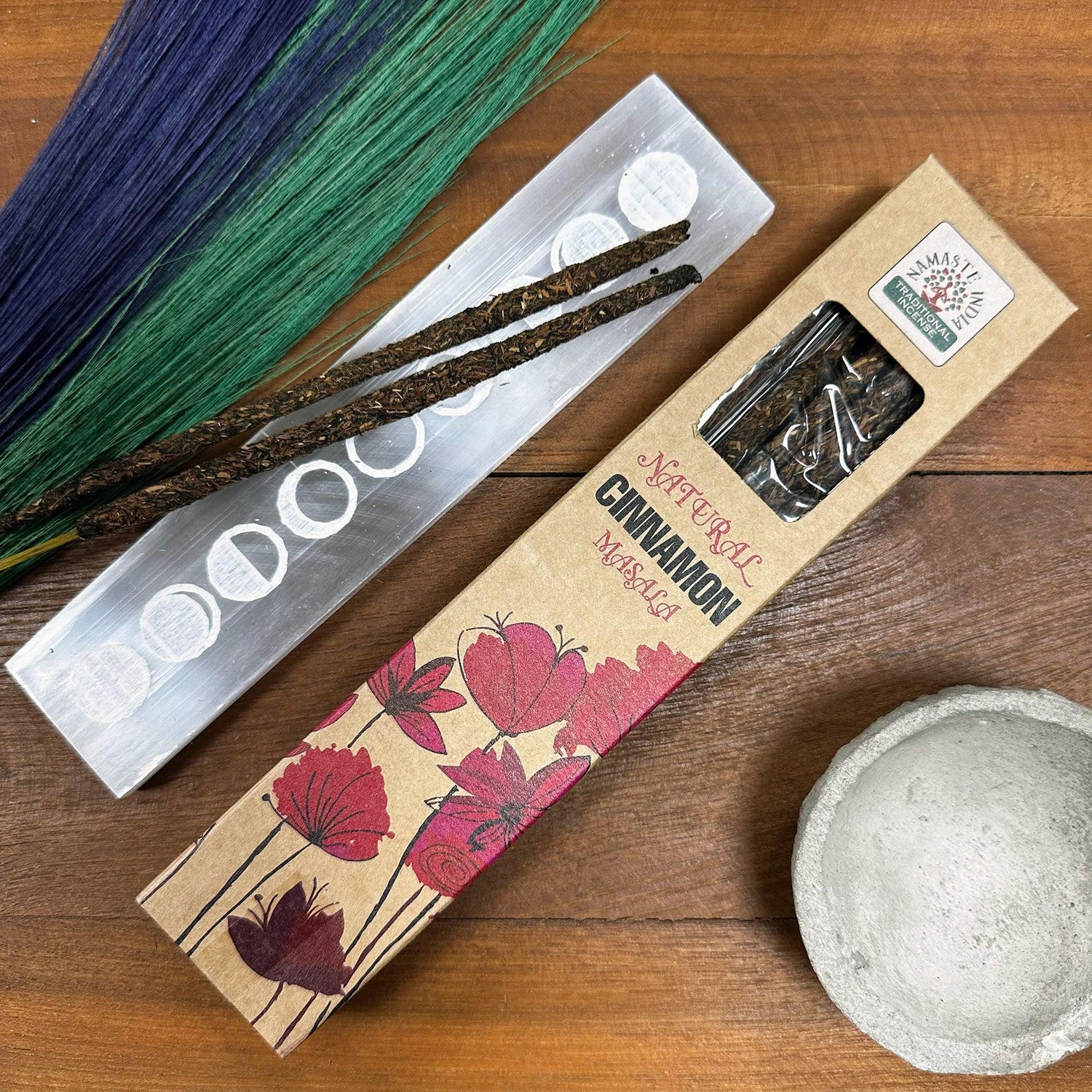 AW GIFTS Natural Botanical Masala Incense in cinnamon scent, shown in a decorative accessory container, highlighting traditional incense presentation.