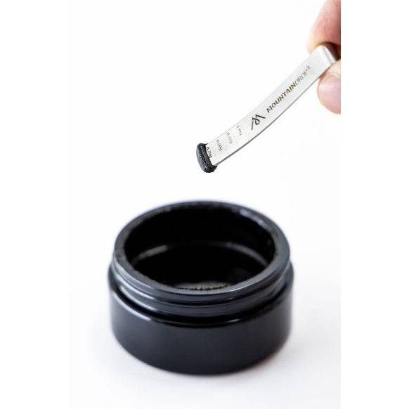 Herbalistas MountainDrop Original 100% pure natural Mumijo Shilajit resin supplement in 45g jar, showing the resin in a natural state.