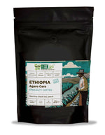 Freshly brewed Ethiopia Agaro Gera coffee in a cup, showcasing green Life Specialty Coffee by La Tosteria.