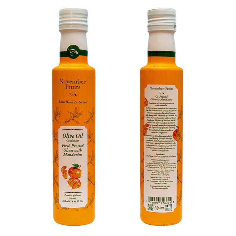 Co-pressed olives and mandarins in a bottle of Elixir Flavours olive oil, showcasing the natural ingredients and rich texture.