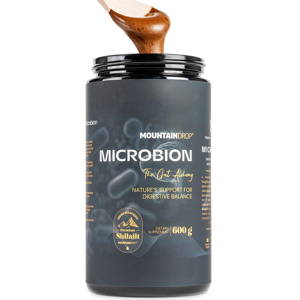 Herbalistas MountainDrop MICROBION supplement in a 600g natural blend for gut health, showing the product packaging and scoop.