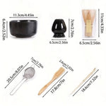 Six-piece Japanese-style bamboo matcha set with bowls, whisks, and scoop, perfect for traditional tea preparation.