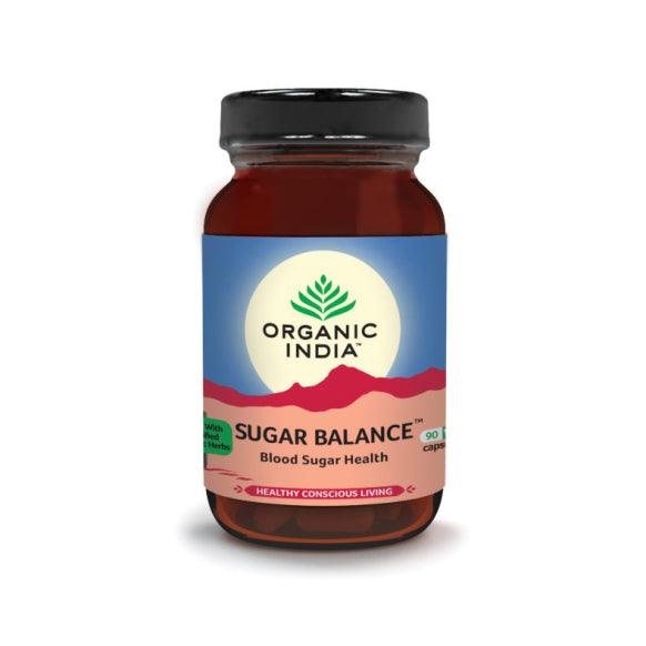 Organic India Bio Sugar Balance capsules by Herbalistas, showing a bottle of 90 capsules with label and supplement details.