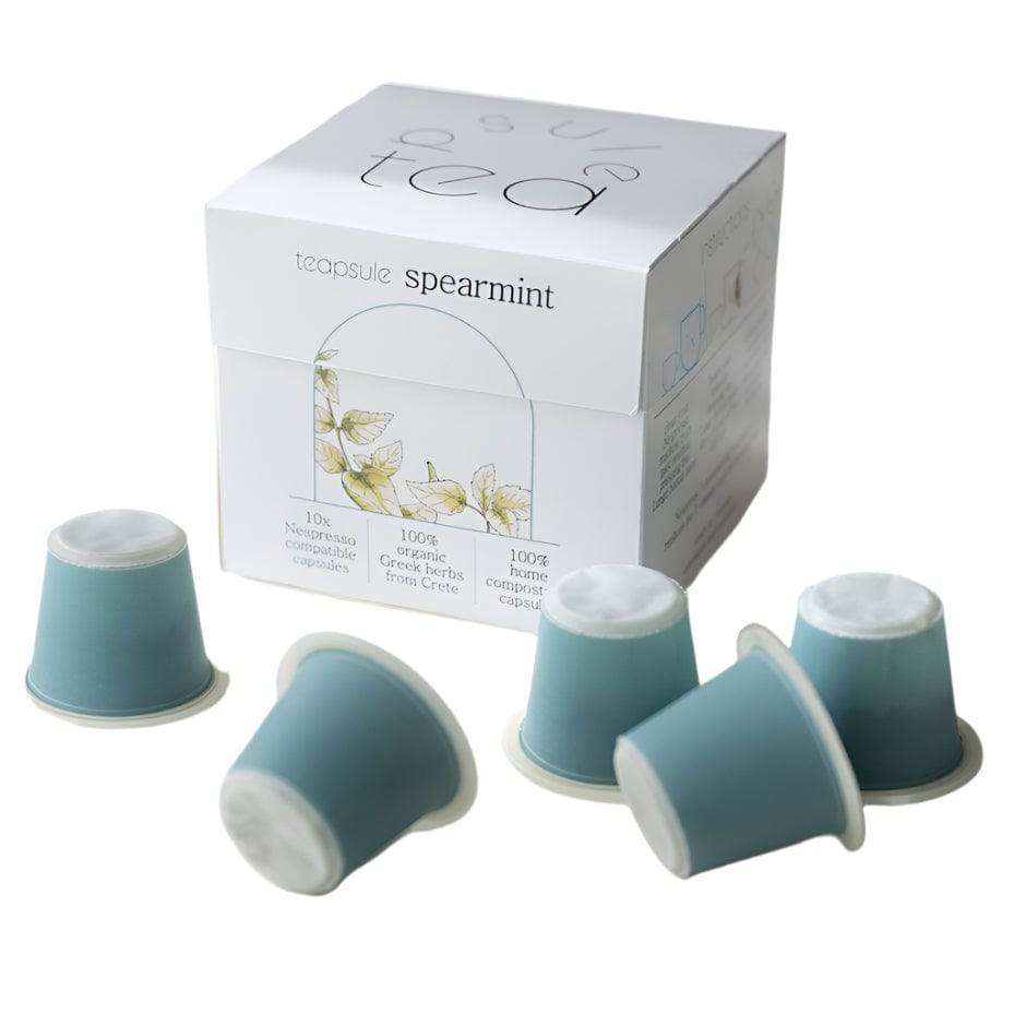 Spearmint tea capsules by TEAPSULE, showing a close-up of 10 green capsules in a transparent container.