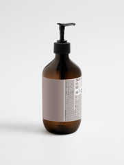 Selfnamed 2-in-1 hair and body wash for men with a sleek bottle, featuring a modern label and clear product details.